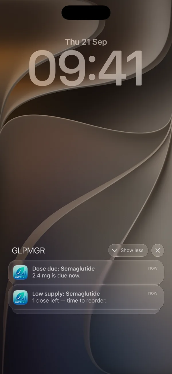 iPhone lock screen showing a GLPMGR dose due and a low supply notification